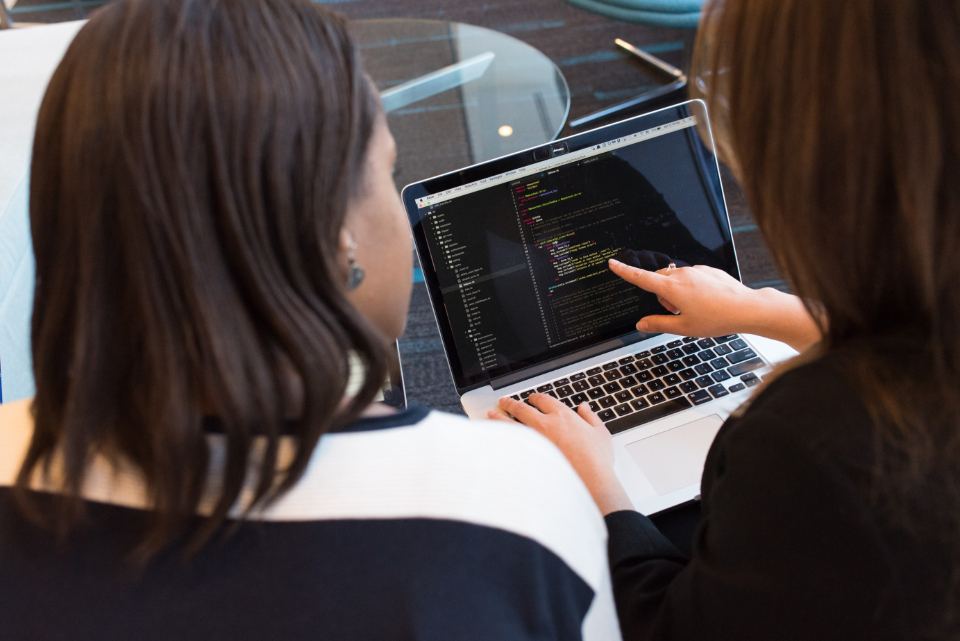 Developers reviewing code